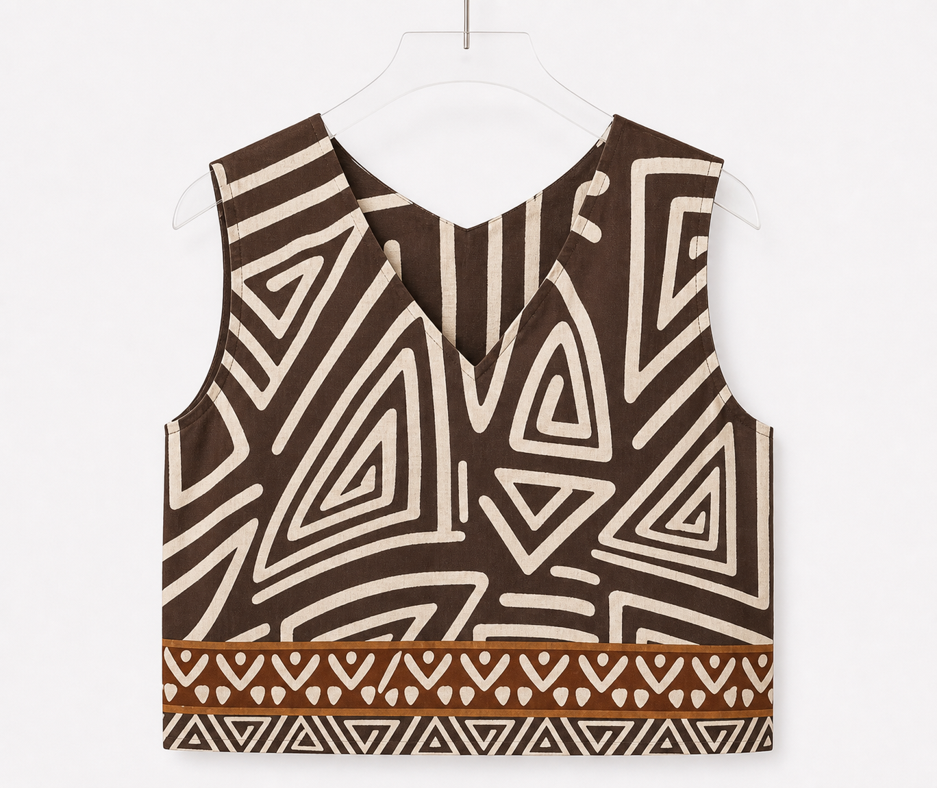 Top smanicato con stampa geometrica e bordo a contrasto