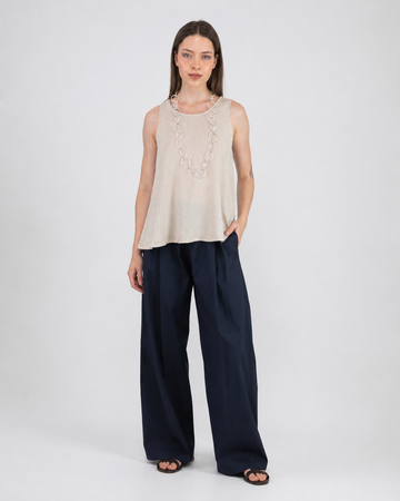Top smanicato in lino con bottoni sul retro